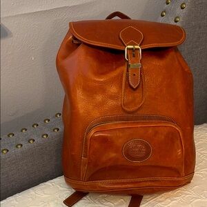 Vintage Eddie Bauer Brown Leather Backpack 
It could be used for men or women.